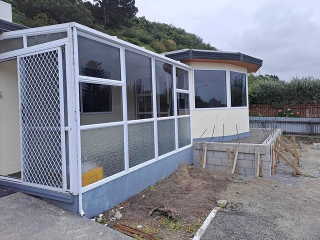 New sunroom extension and concrete base preparation, part of a home renovation in Kaikōura by Master Builders Stanton Builders.